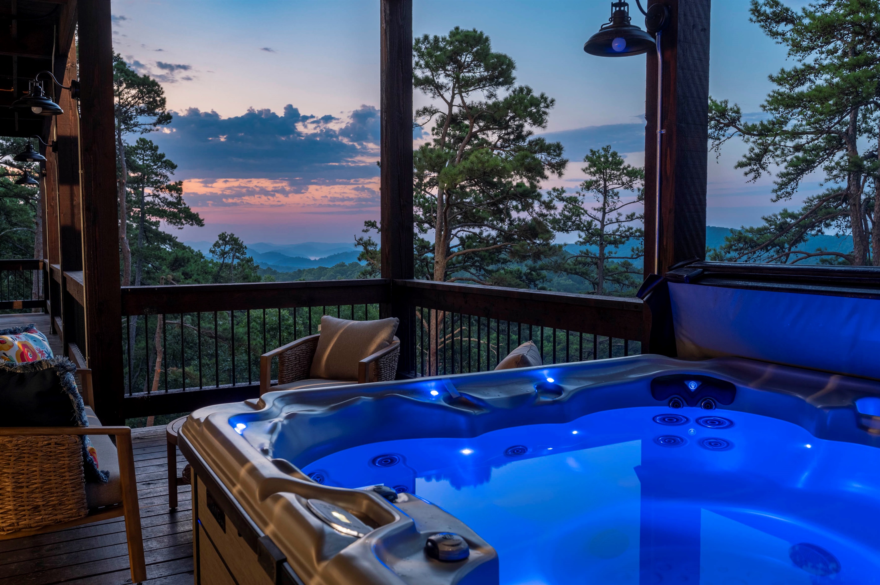 Private hot tub experience with glowing evening skies and peaceful mountain surroundings