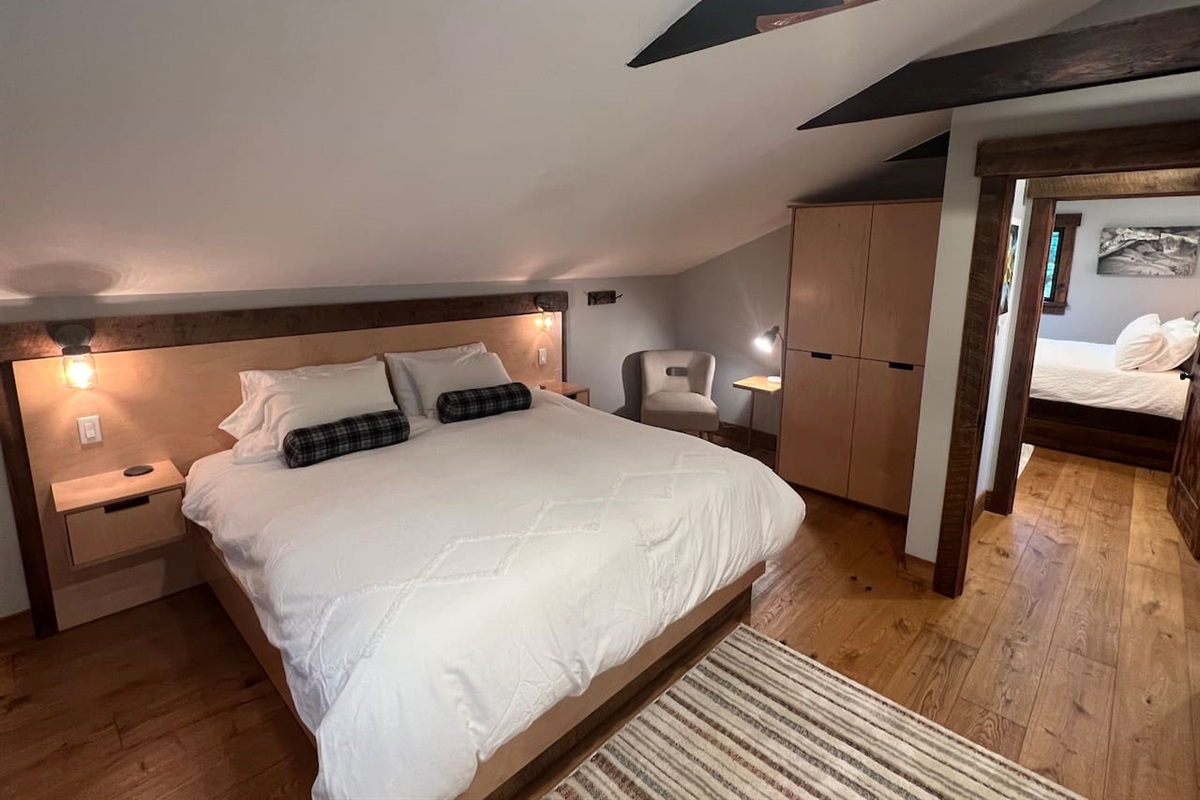 King bed master suite with Tempur-Pedic mattress, Smith and Valley built in's, exposed reclaimed collar ties and white oak flooring