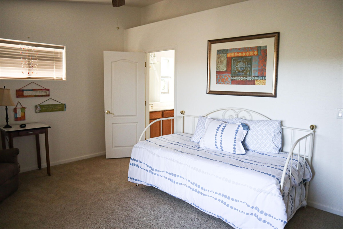 Bedroom 4 offers a twin size bed with trundle and ceiling fan.