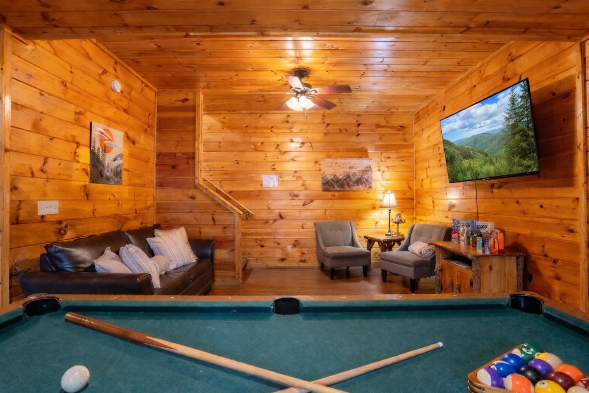 Enjoy the perfect location for movie night or watching the game while playing games.