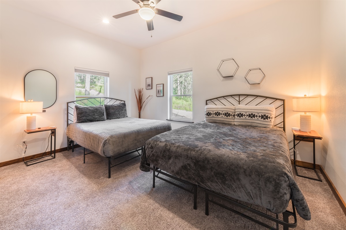 Guest bedroom with two queen beds