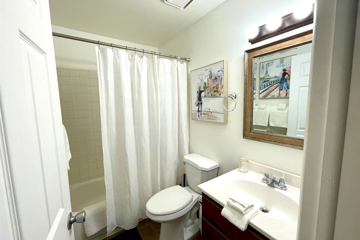 Full bathroom with tub