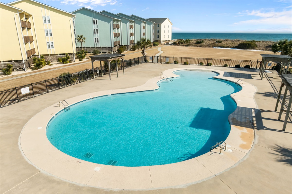 Pool with ocean views, perfect for relaxing after a day at the beach