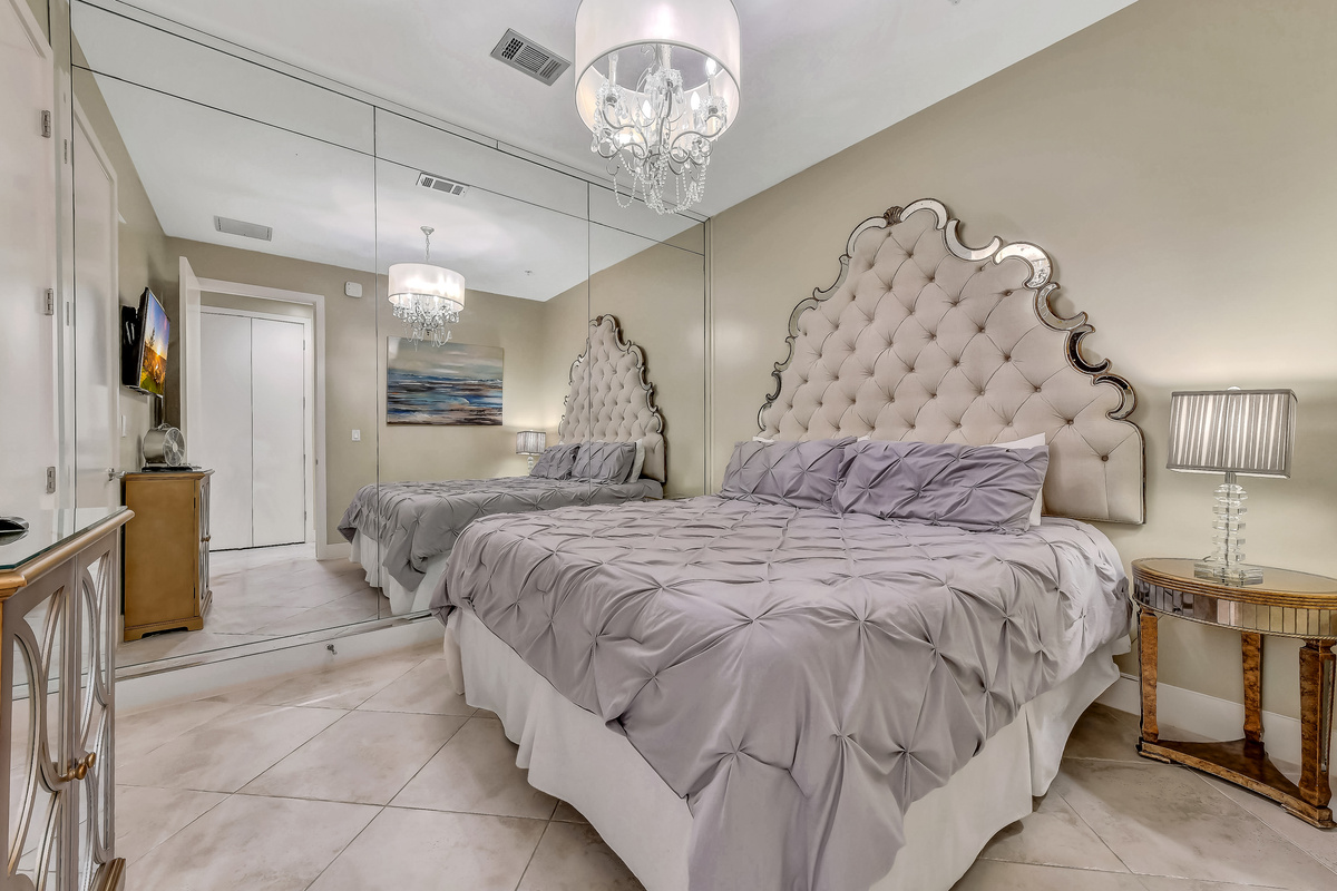 Guest bedroom with TV so you can enjoy sports and shows in the privacy of a dark inside bedroom.