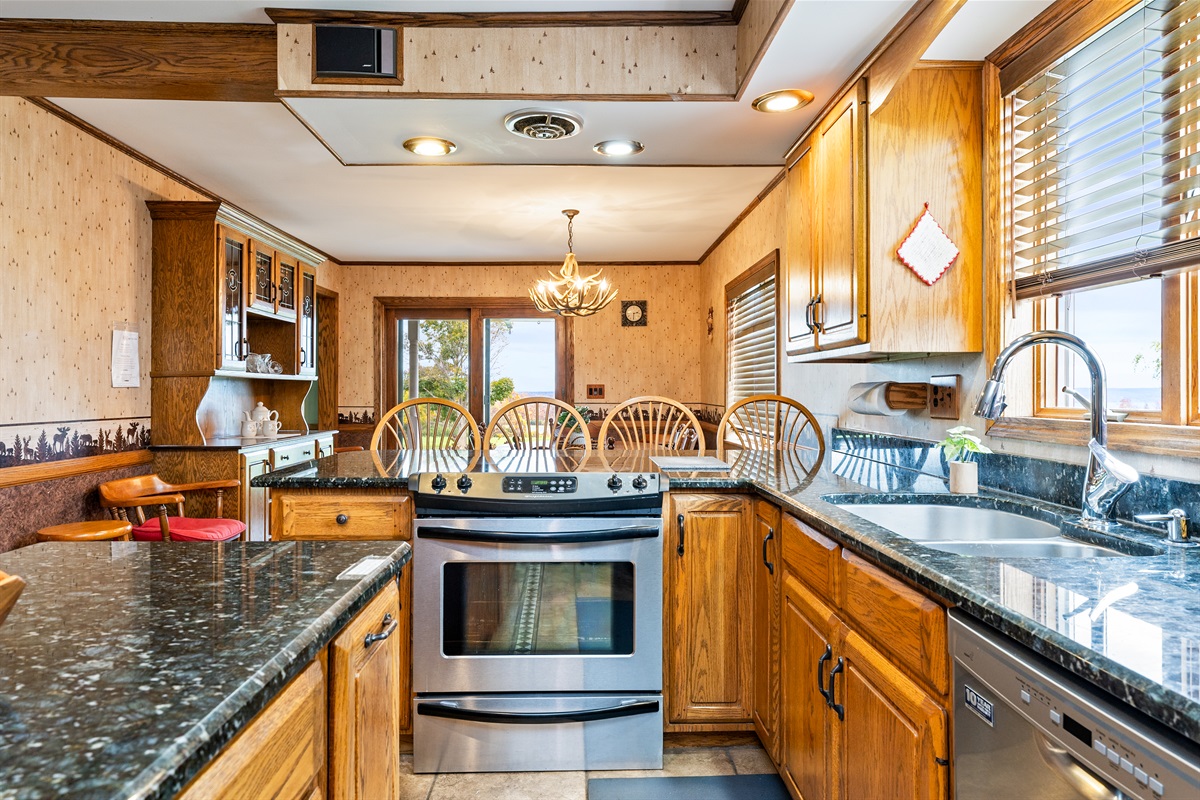 Bright, open kitchen with ample counter space — ideal for prepping local produce or sipping morning coffee
