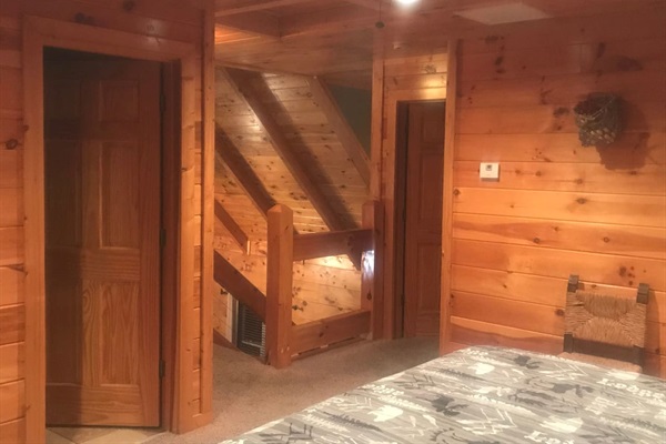 Loft, bedroom open over living room please note there is no doorno door