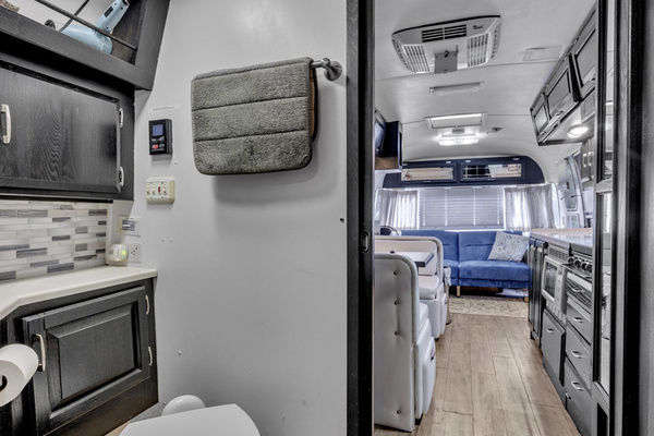 Efficient layout keeps the kitchen, bath, dining, and living spaces close at hand