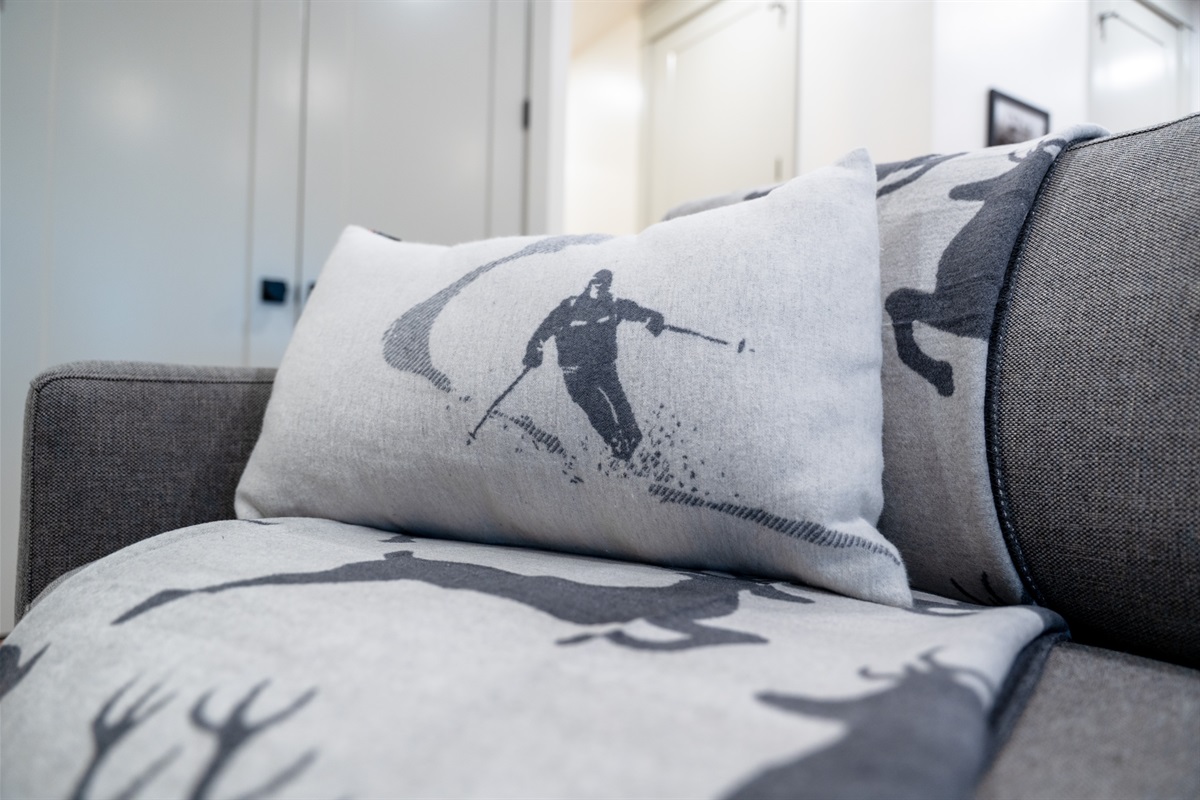 Mountain-inspired decor creates a warm alpine retreat.