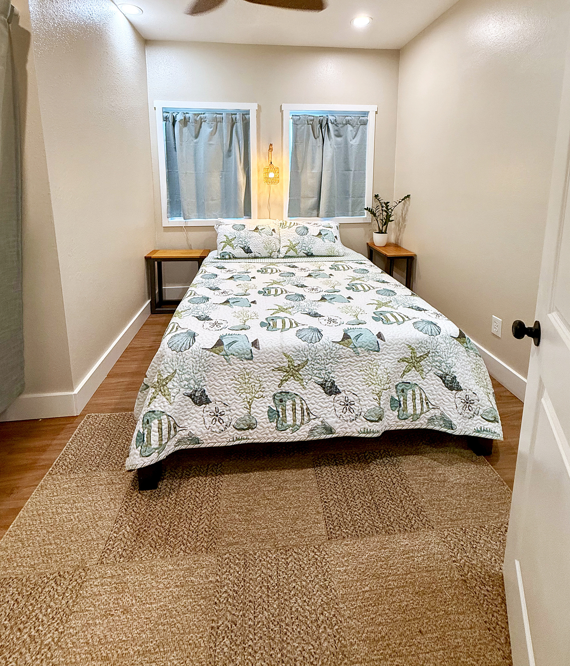 Queen Bedroom 2 | Representative Interior. Finishes, decor, and furniture, vary by unit.