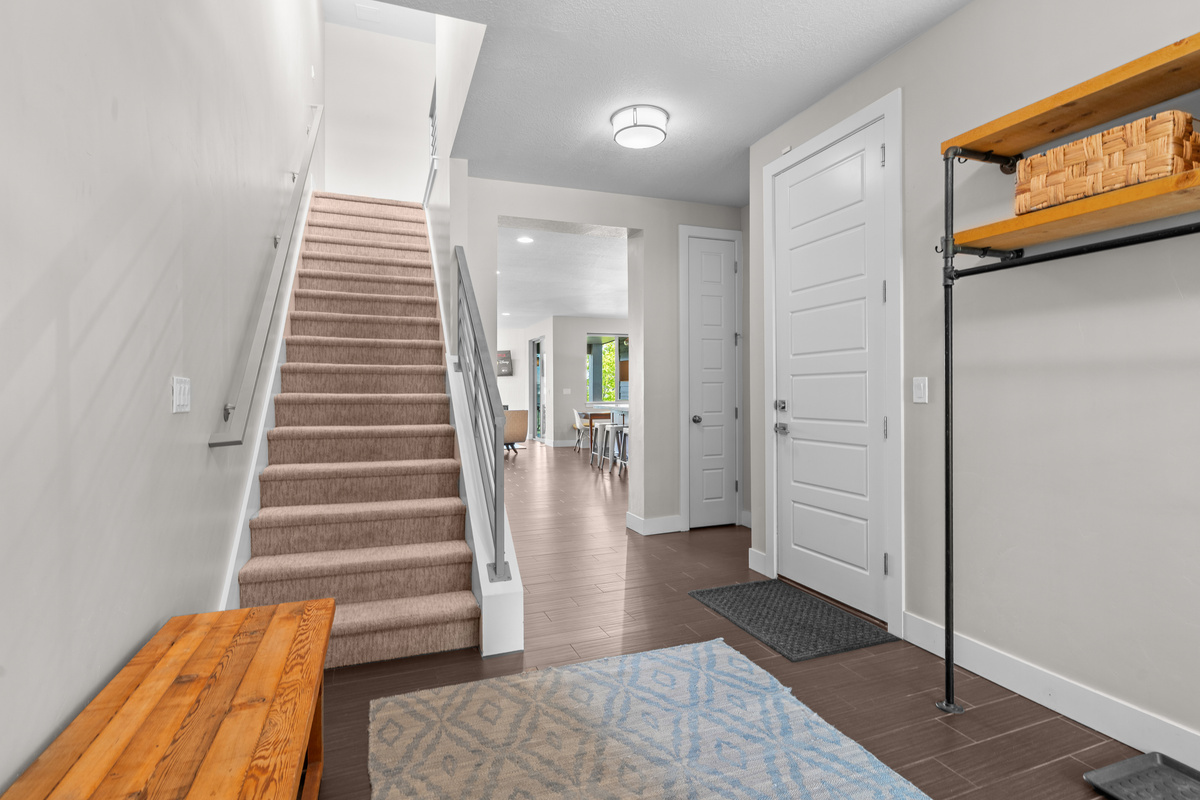 A welcoming entryway with plenty of room for coats, boots, and gear.