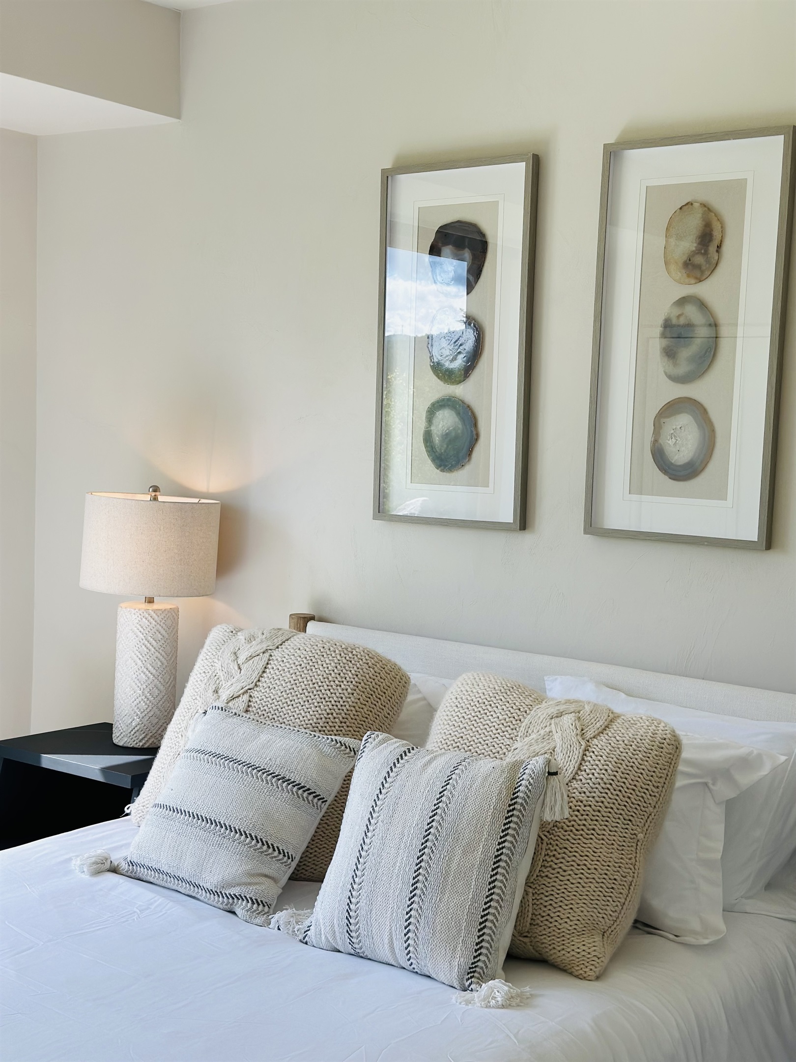 First-floor queen bedroom with sliding glass doors