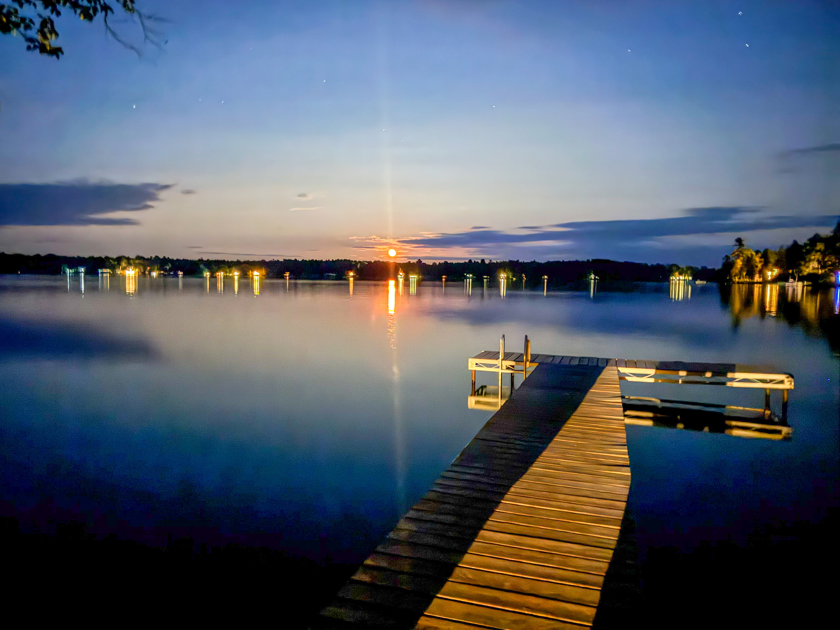 Experience the moon over Beech Hill Pond from your private dock at Loonrise Point! Stargaze under dark Maine skies with glowing dock reflections and calm waters in Otis, ME. Pure, quiet night magic just 20 minutes from Ellsworth.