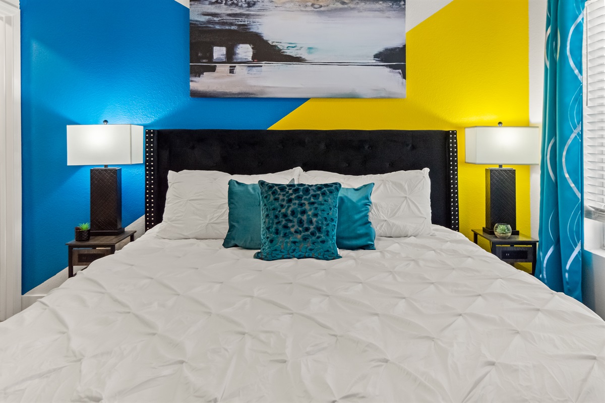 Spacious bedroom with modern décor and cozy touches
