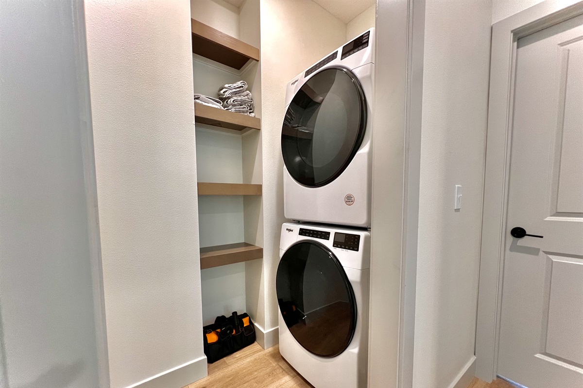 Stacked washer and dryer on main level