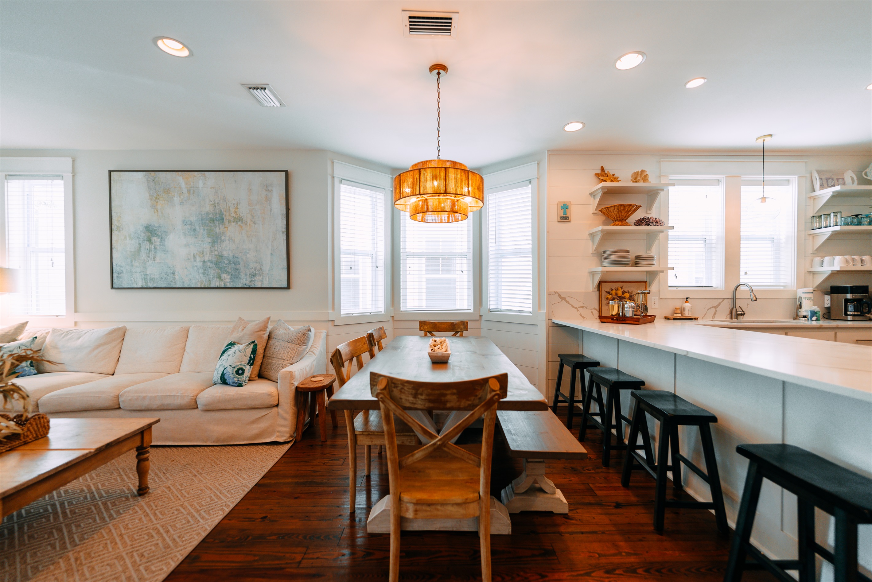 Kitchen and den area connect with plenty of room for your large group