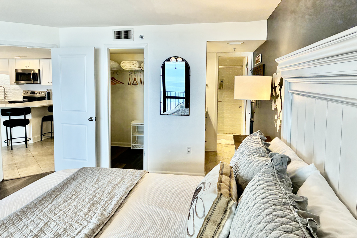 View of the walk-in closet and entrance to the master bathroom.