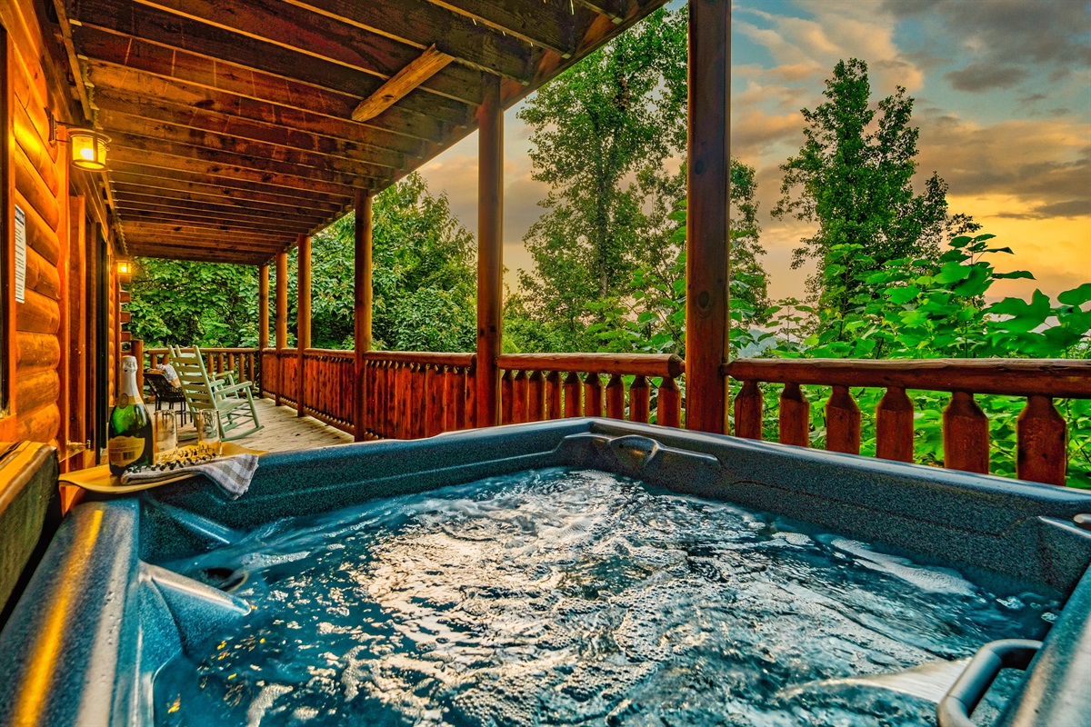 Relax in the lower deck hot tub as you enjoy the sunset & views