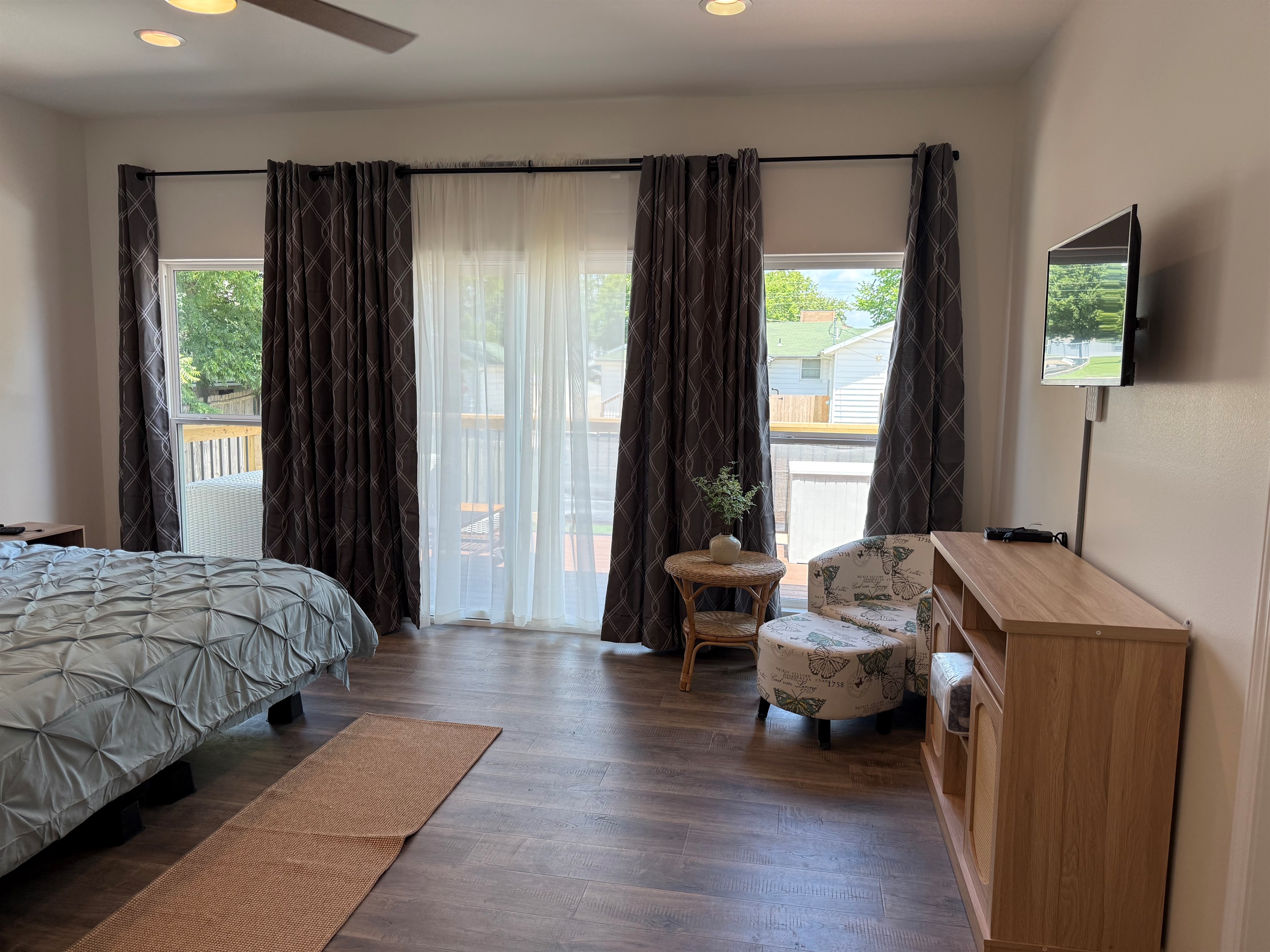 Master Bedroom with huge windows overlooking large inviting deck space
