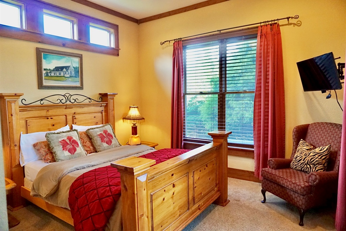 Cozy up in this charming bedroom. Sweet dreams guaranteed.