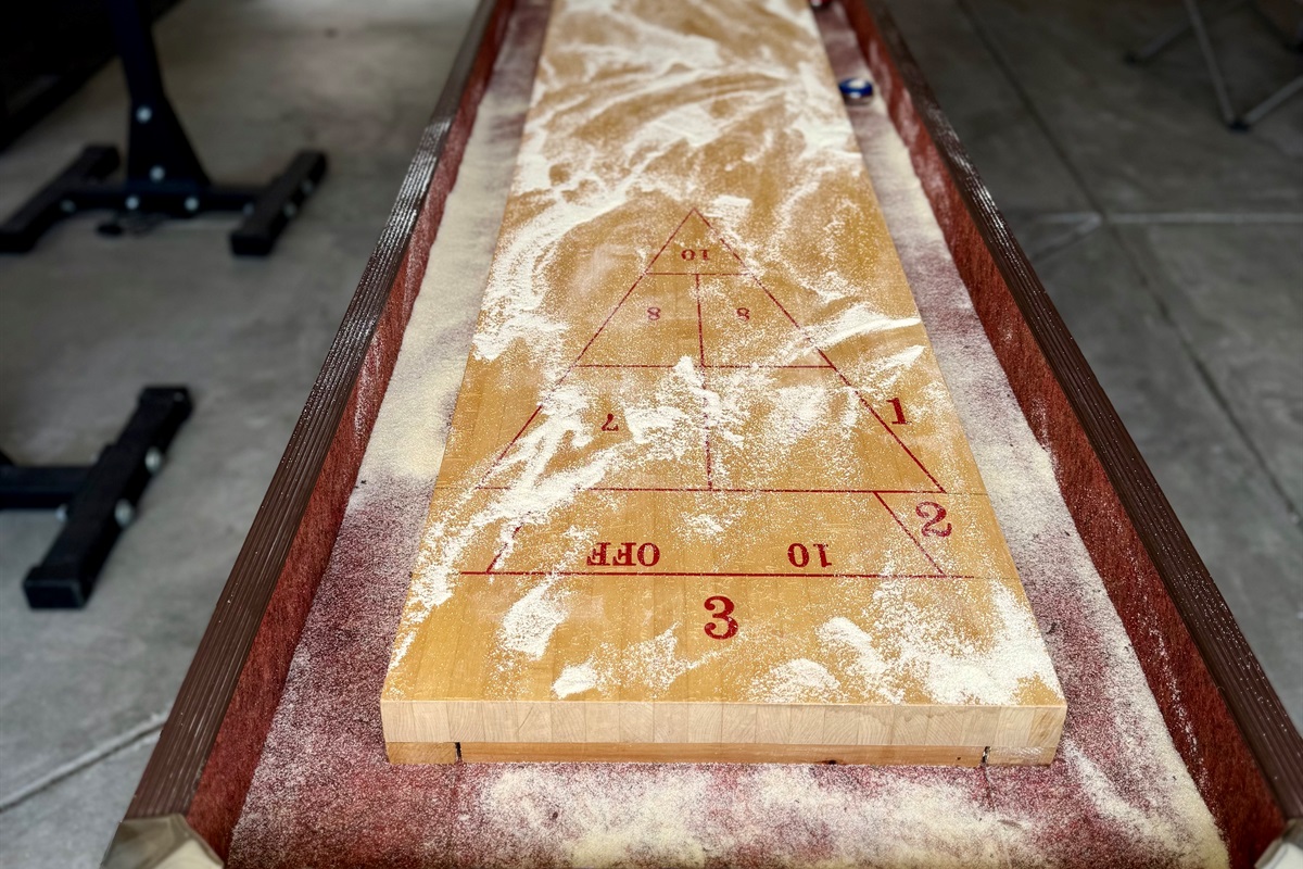 Garage turned shuffleboard game room. 