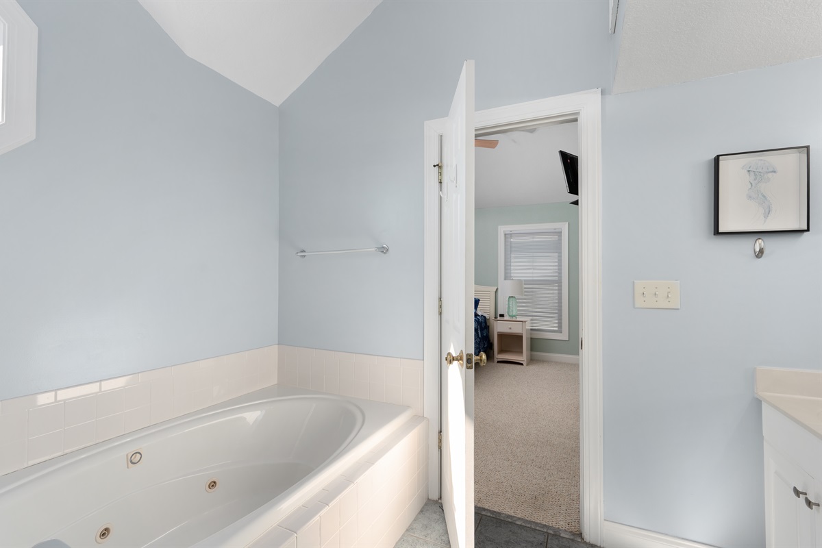 Top level king br Ensuite Master bathroom with shower, double vanity and jacuzzi tub