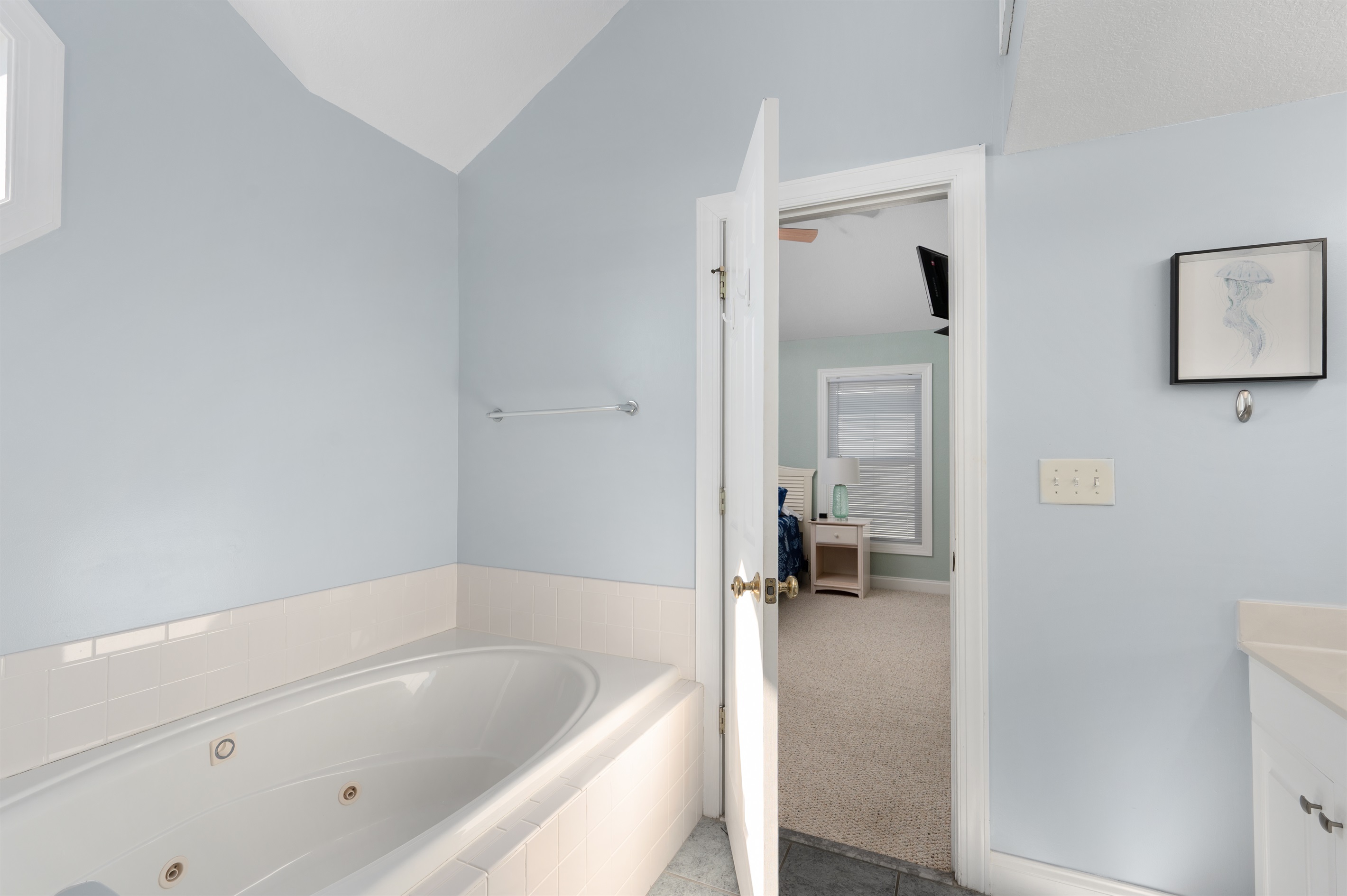 Top level king br Ensuite Master bathroom with shower, double vanity and jacuzzi tub