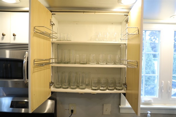 Kitchen cabinet showing glassware