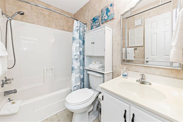 Secondary bathroom with shower and tub