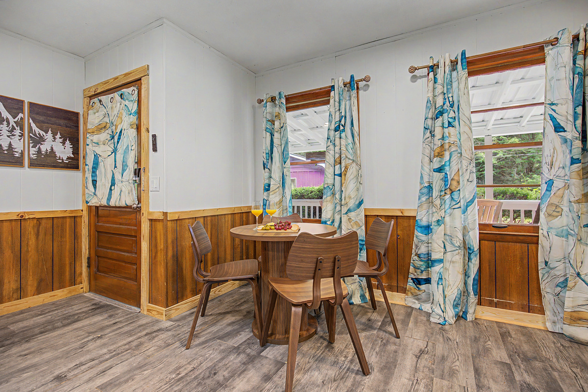 Dining Nook: Enjoy meals with style beside bright windows and vibrant decor!