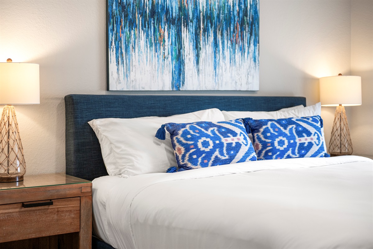 Cozy guest room with natural light and a plush king bed for sweet dreams
