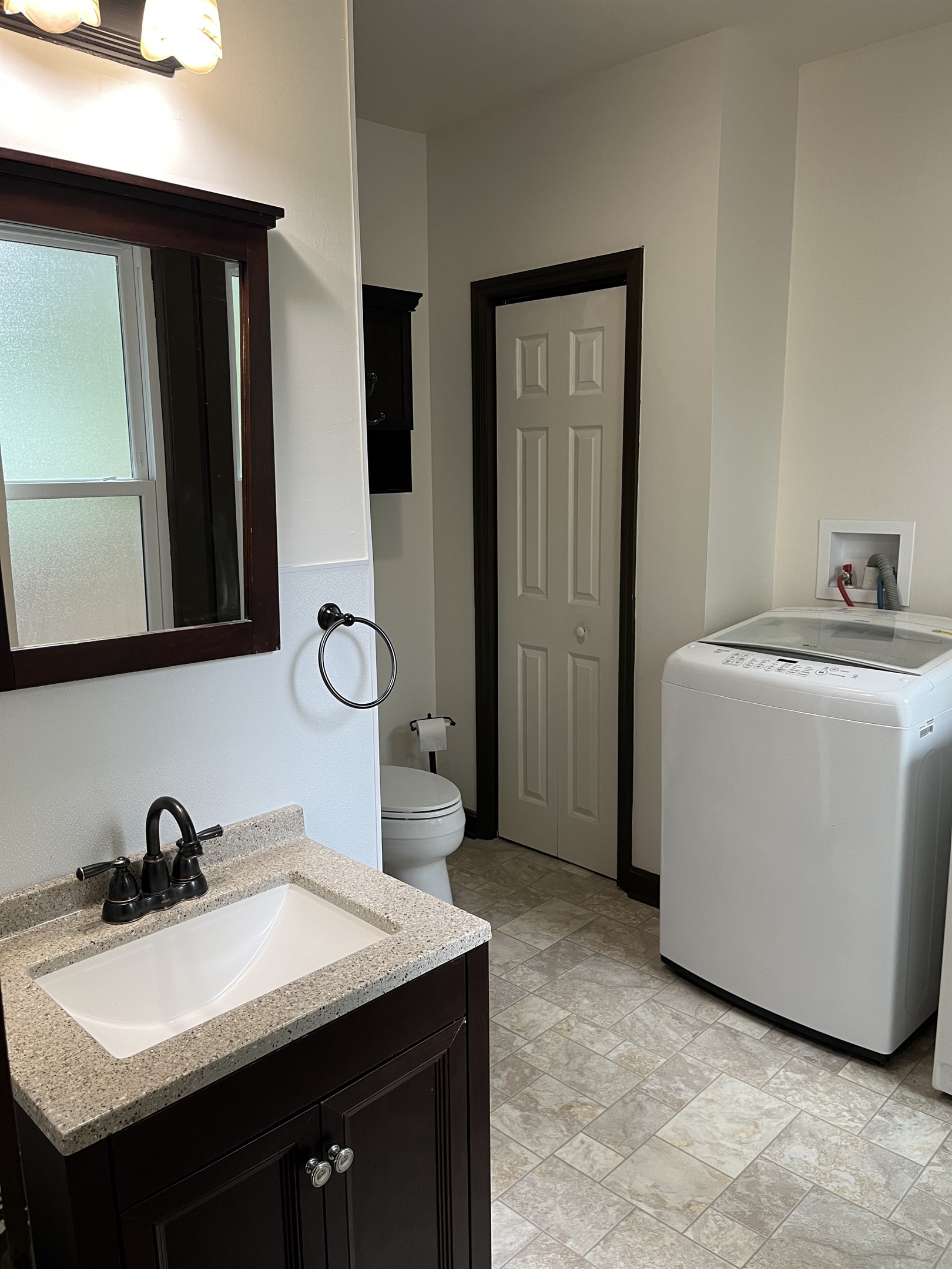1st floor bath with tub/shower and laundry