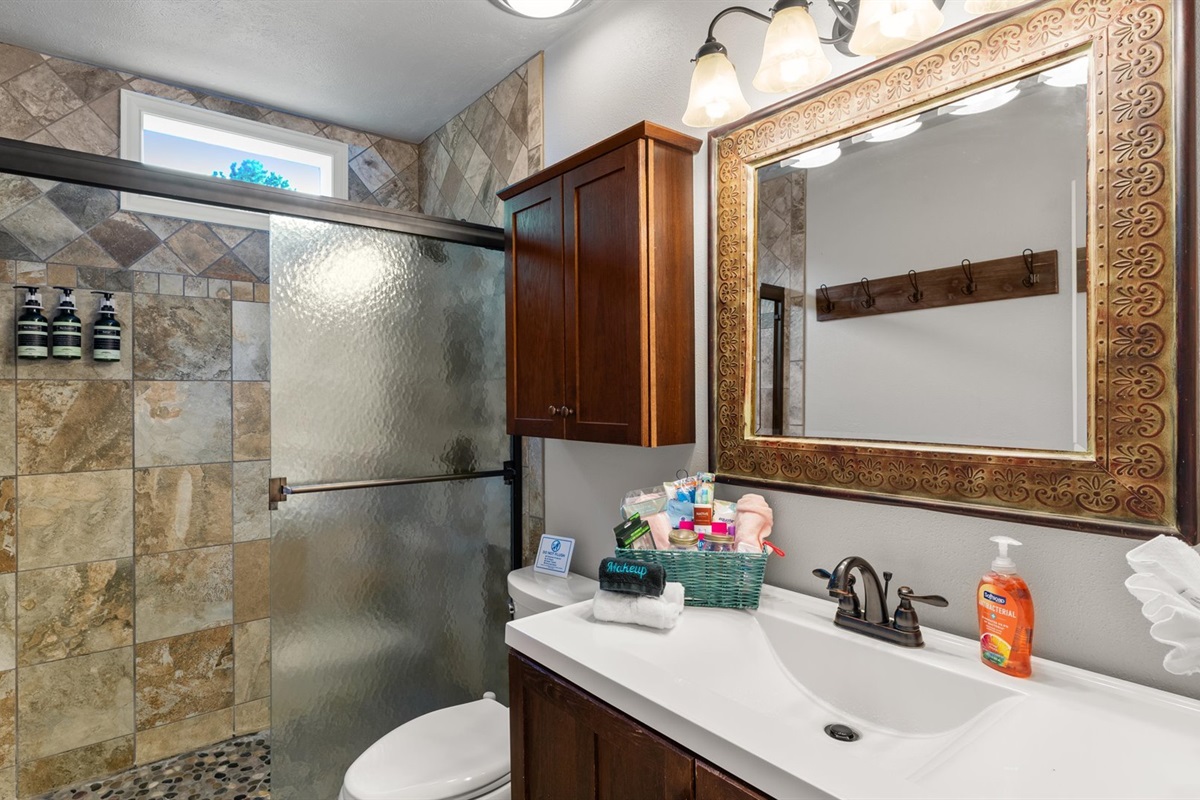 The hallway bathroom, located directly across from the trundle bedroom, is perfectly placed for the kids to use without disturbing anyone else in the house.