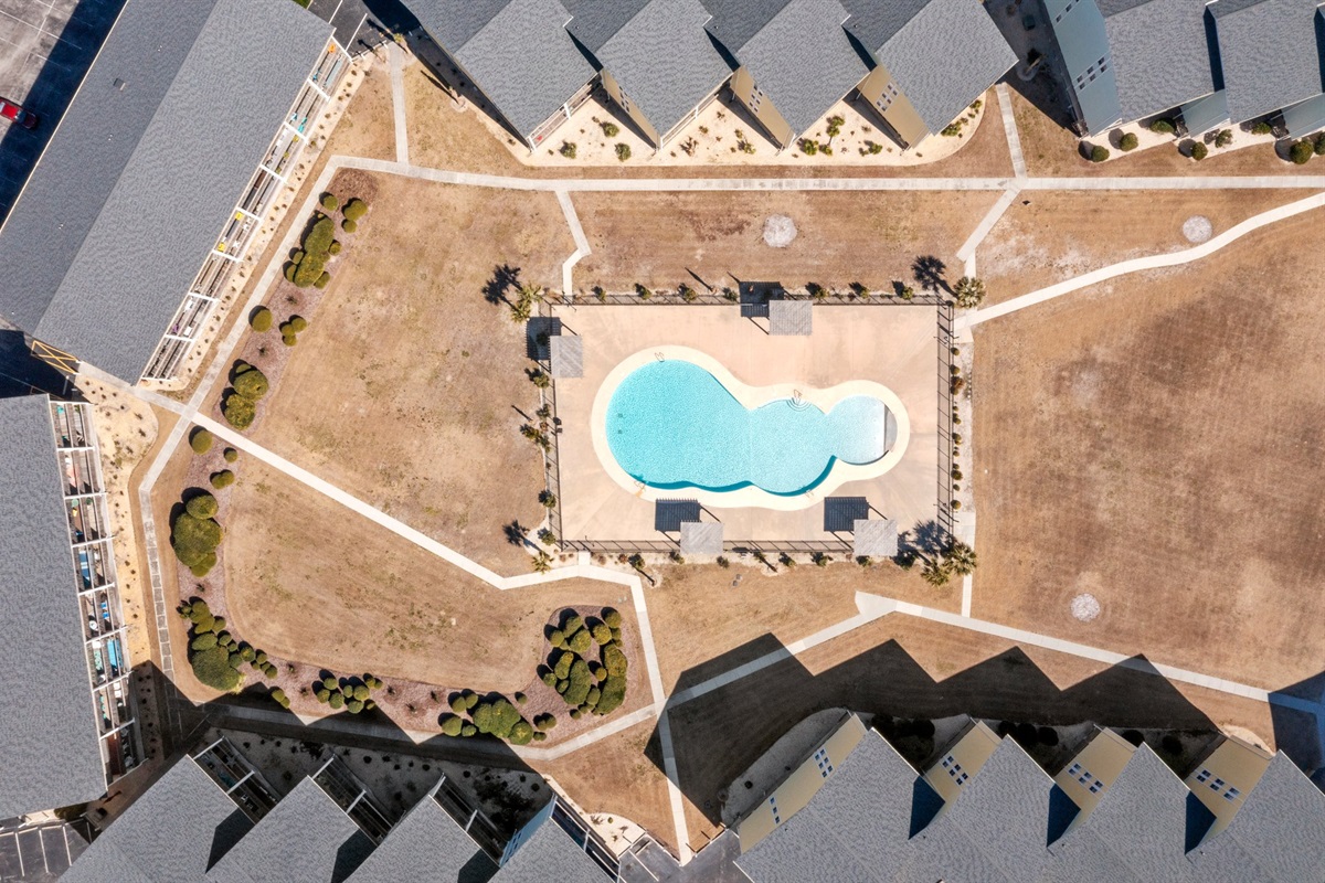 Arial view of the pool and courtyard within Surf
