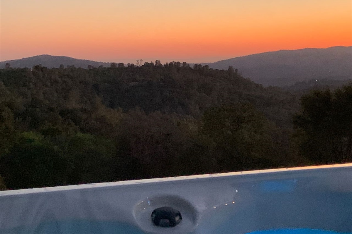 Soaking in the sunset view while soaking in the hot tub