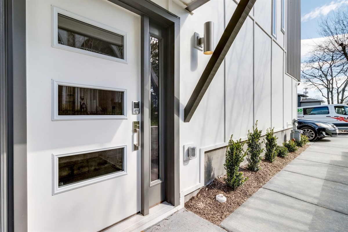 The front door has a keypad lock for 24/7 access by guests