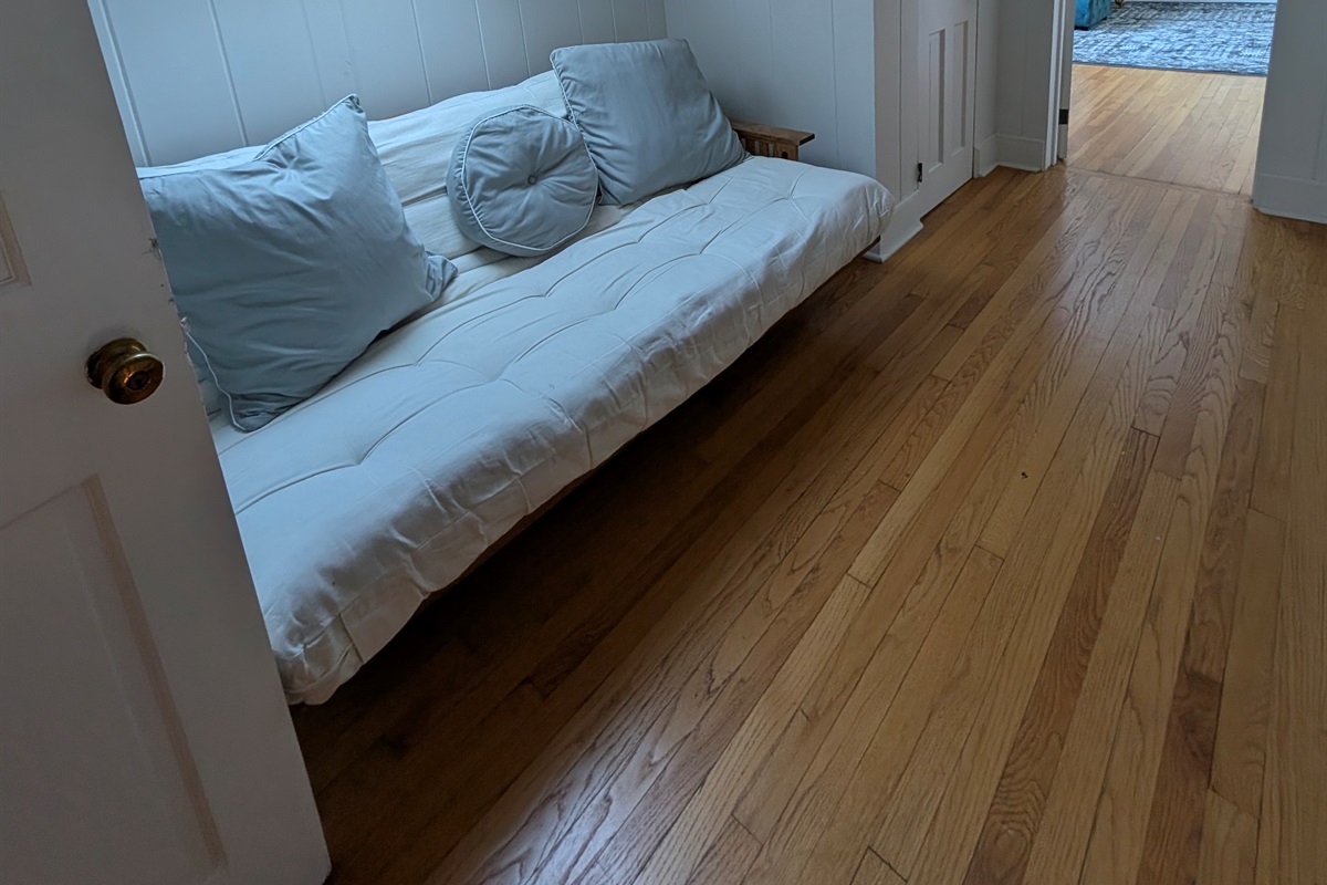 Daybed nook for relaxing or extra sleeping space.