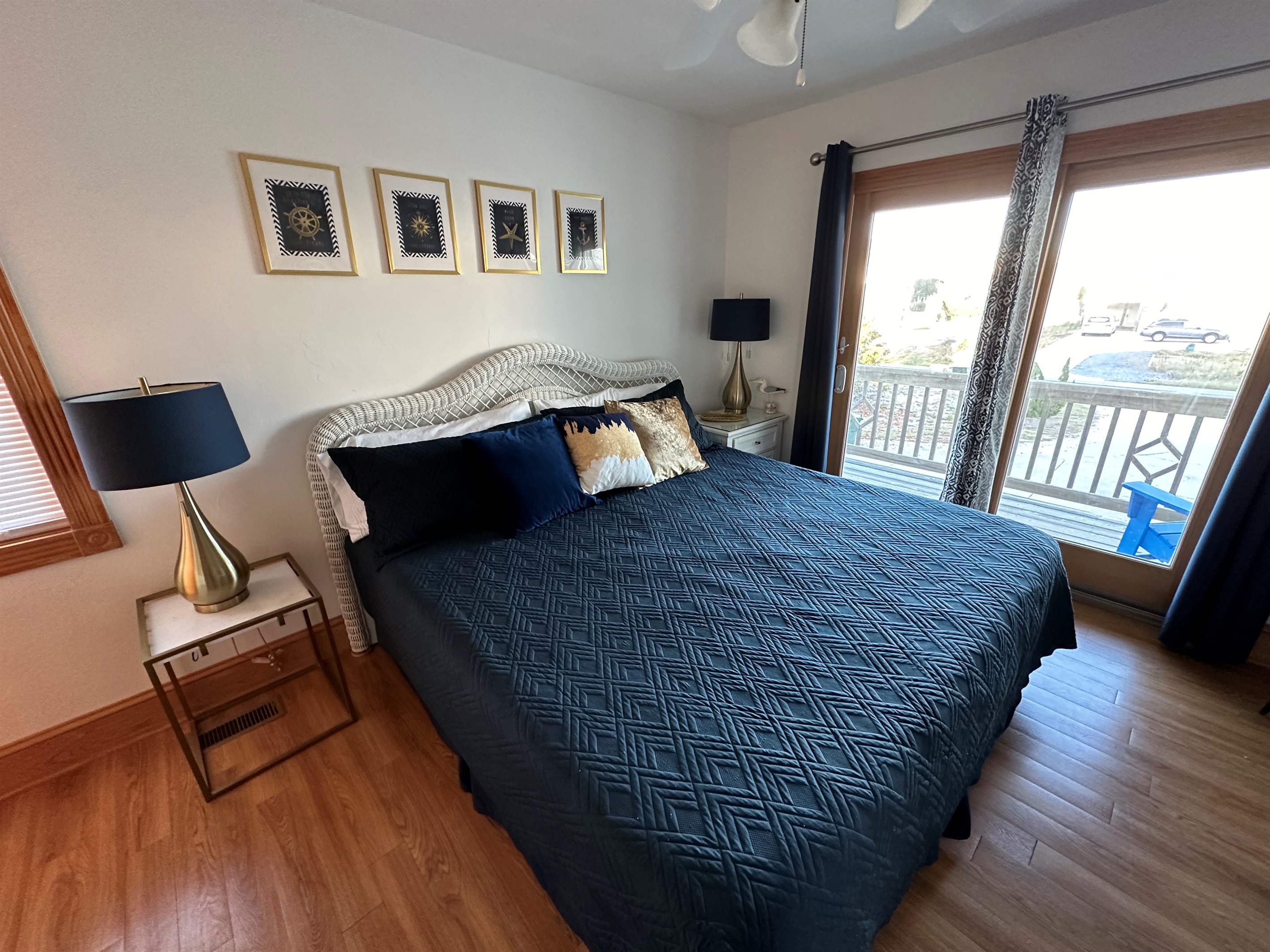 Serene King Master offering deck access through a windowed entrance, and equipped with a TV.