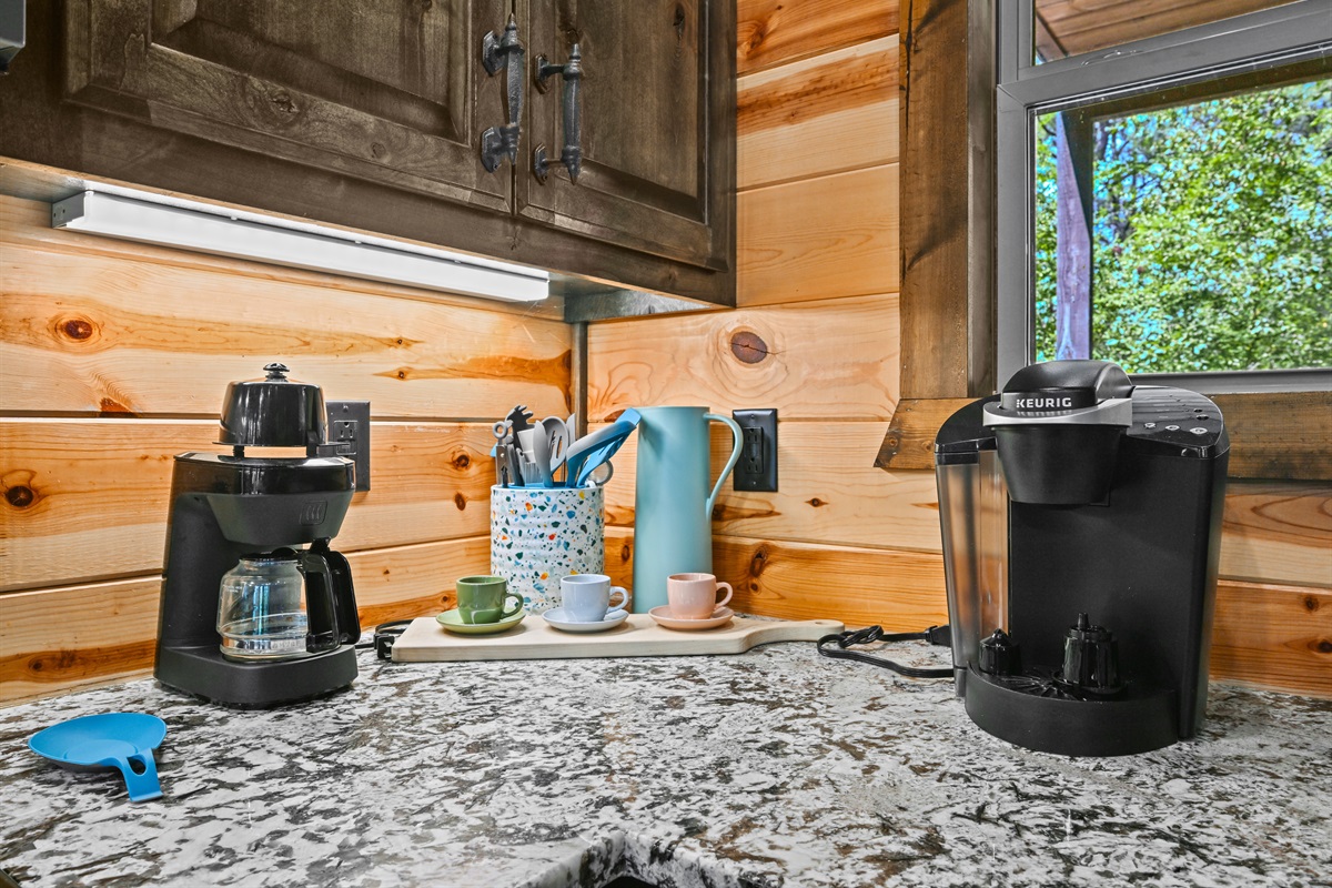 Your coffee bar awaits, featuring both drip and pod options—perfect for early risers and lazy mornings alike.