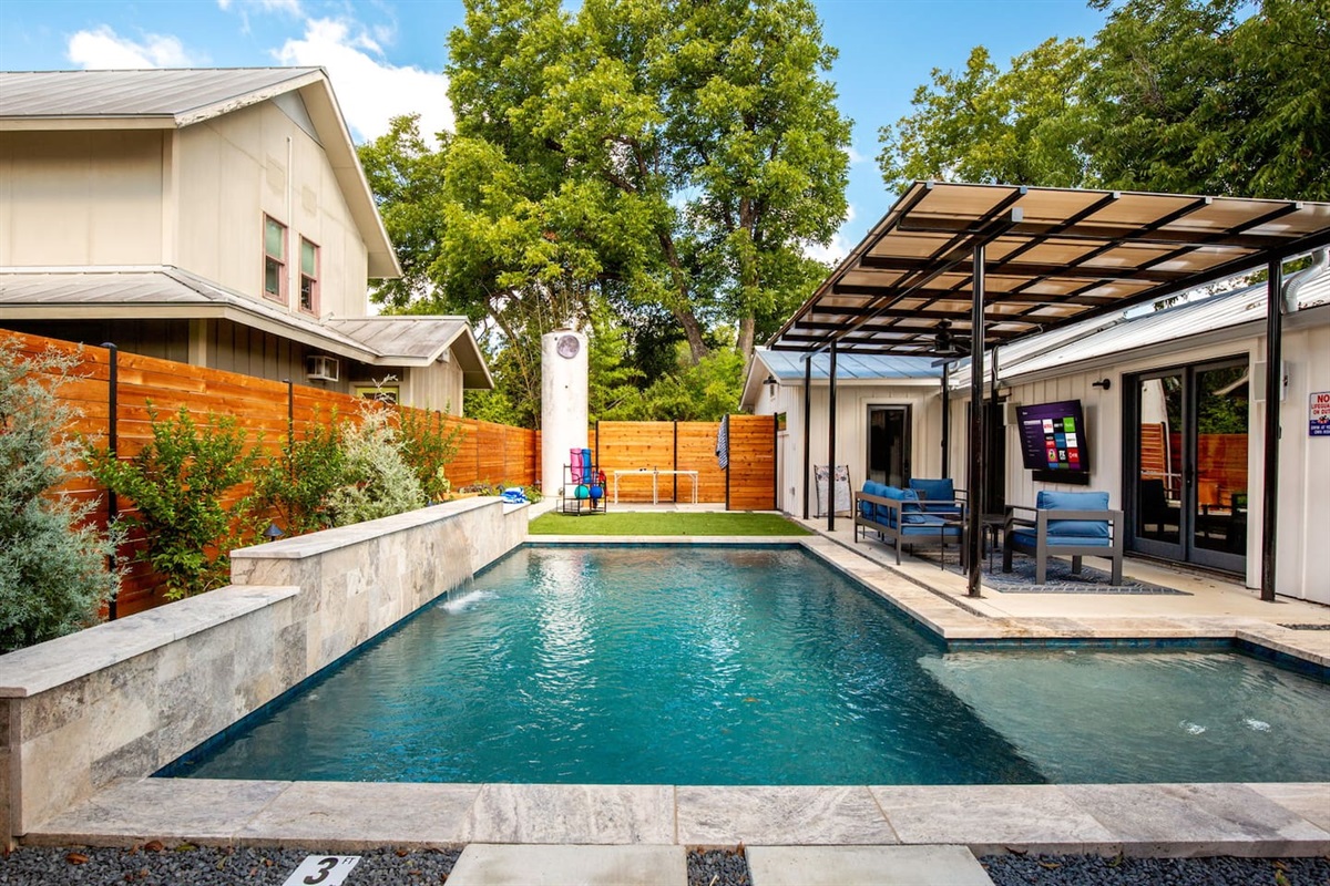 Lush turf area ideal for yoga reading or enjoying the sunshine surrounded by privacy fencing.