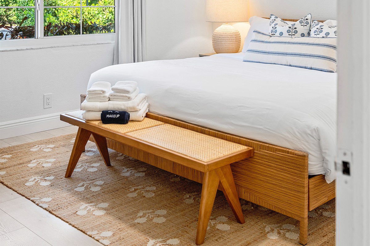 Thoughtful touches for comfort. This inviting bedroom offers a comfortable bed with crisp linens and a convenient bench for your belongings.