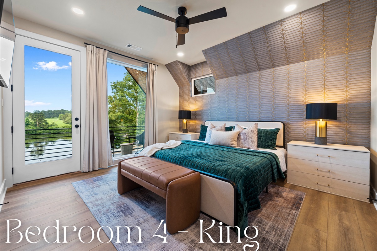 This bedroom features a king-sized bed with luxurious bedding and plush pillows, ensuring a restful and comfortable sleep.