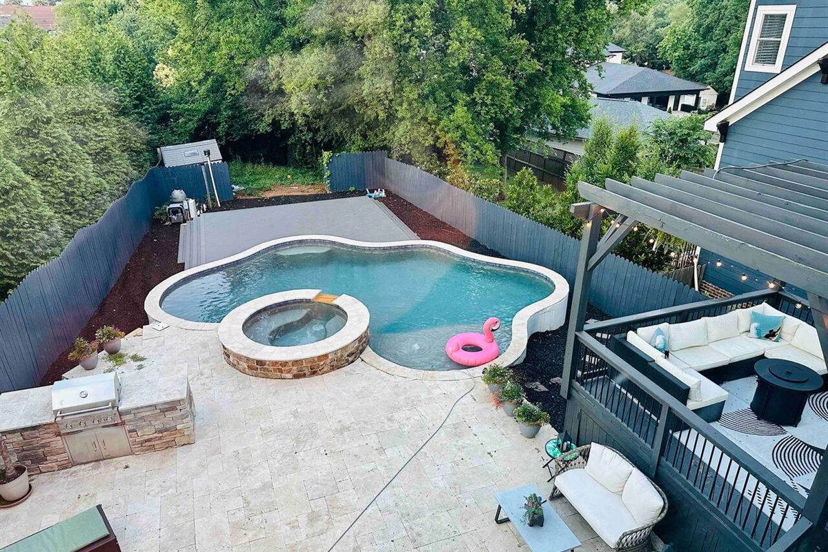 The spacious backyard has pool, hot tub, grill, loungers, and patio. The best part is the incredible bird population that chirps all day! It&rsquo;s such a backyard Oasis. (Also note the close neighbors: NO PARTIES.)