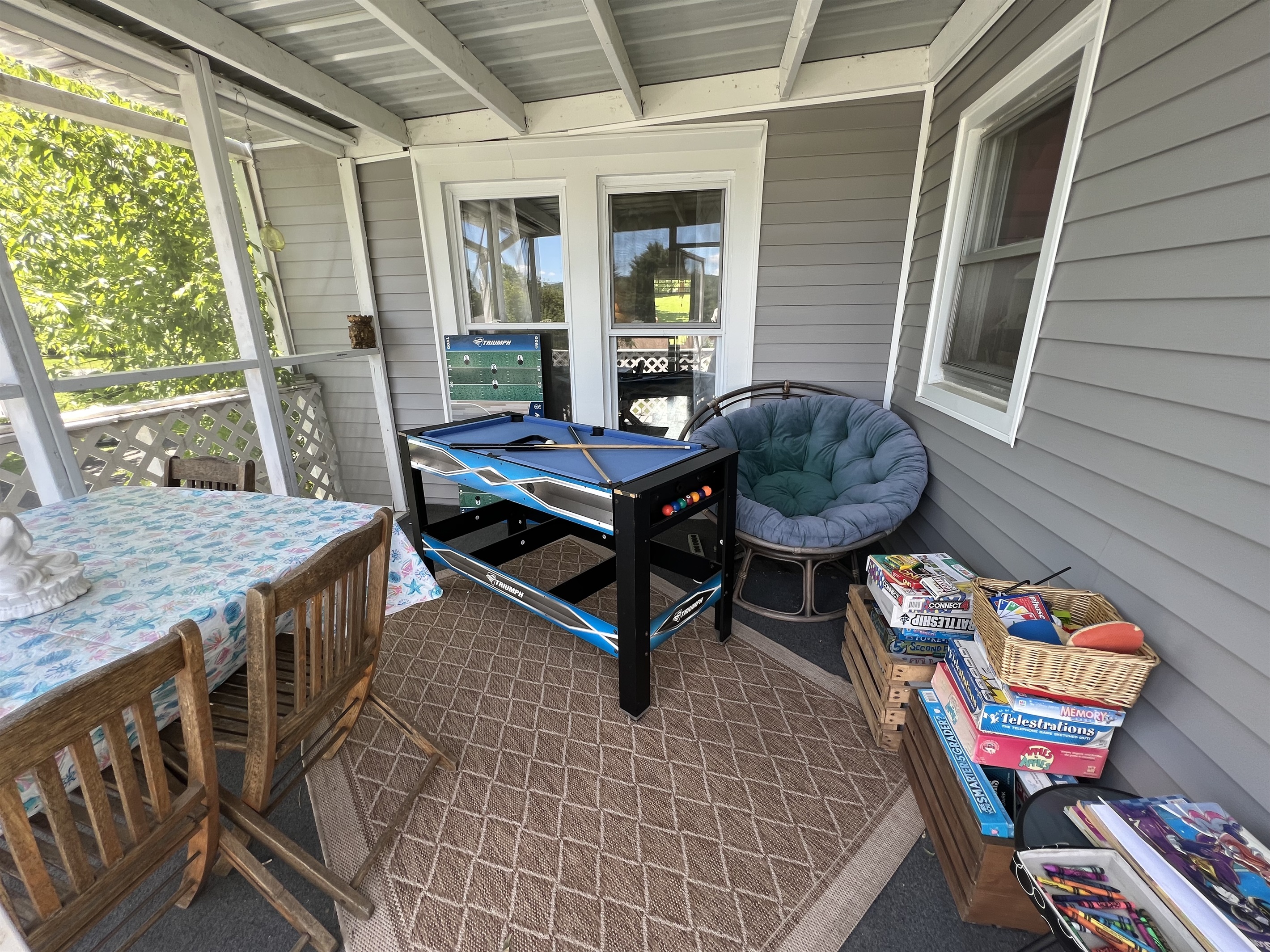 Gameroom in screened porch