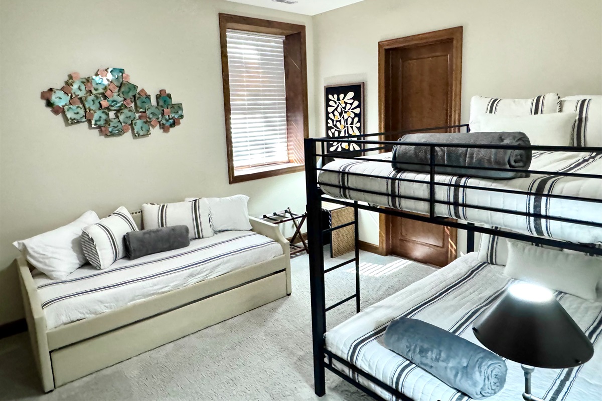 Bedroom 5 has 2 Queens and 2 twin beds