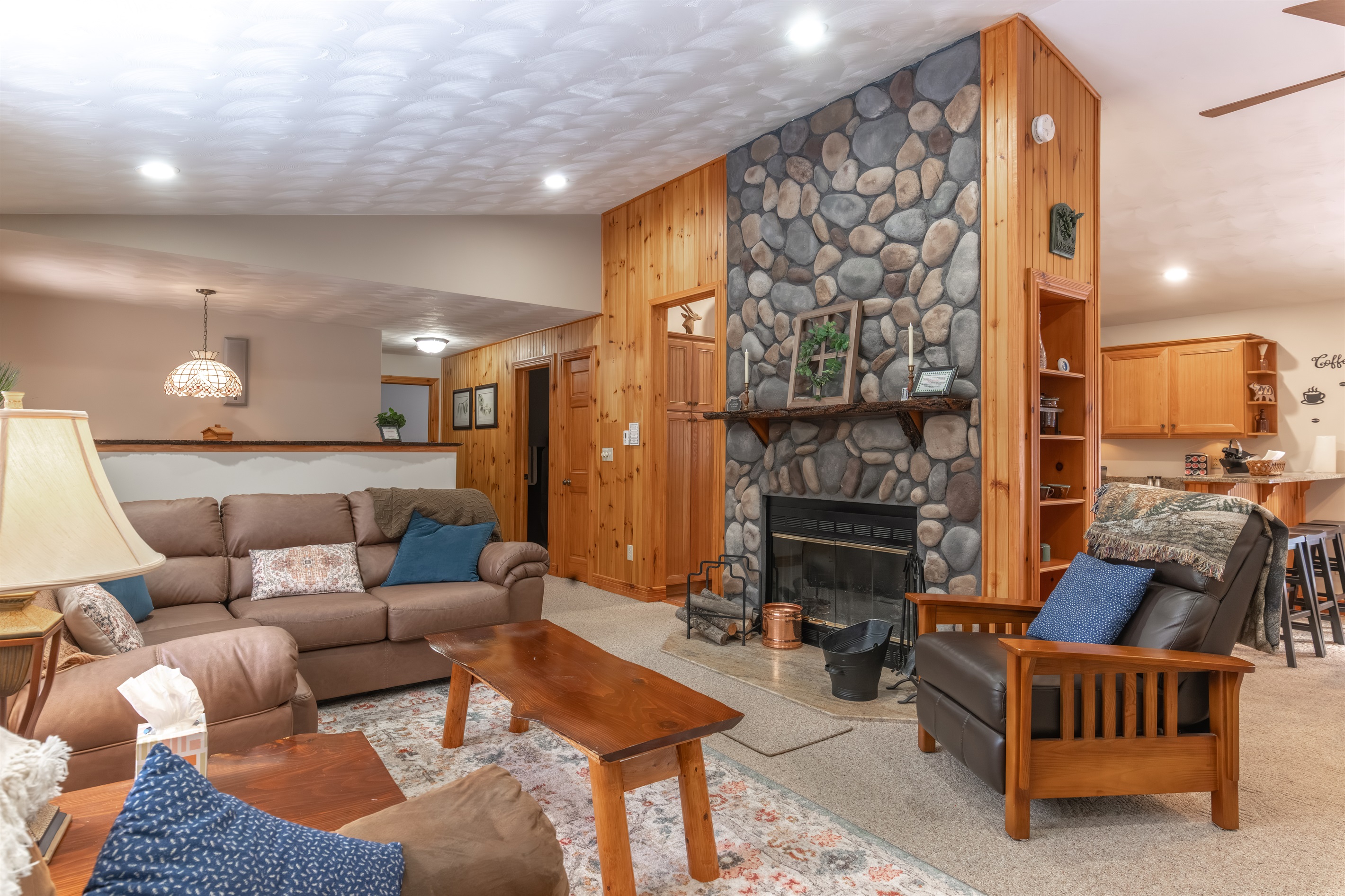 Wind down for the evening with our wood burning fire place, games or TV in our living room with friends and family!