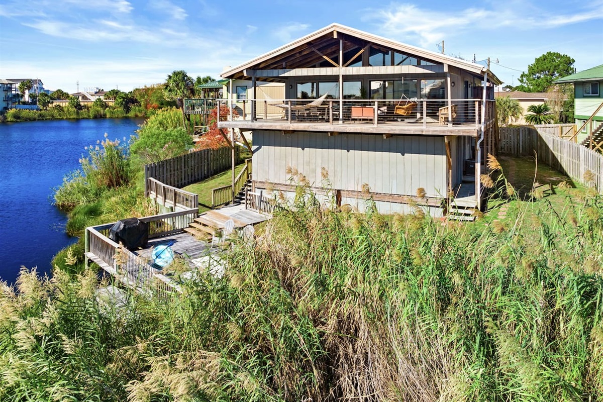 The deck and side yards are fully fenced.