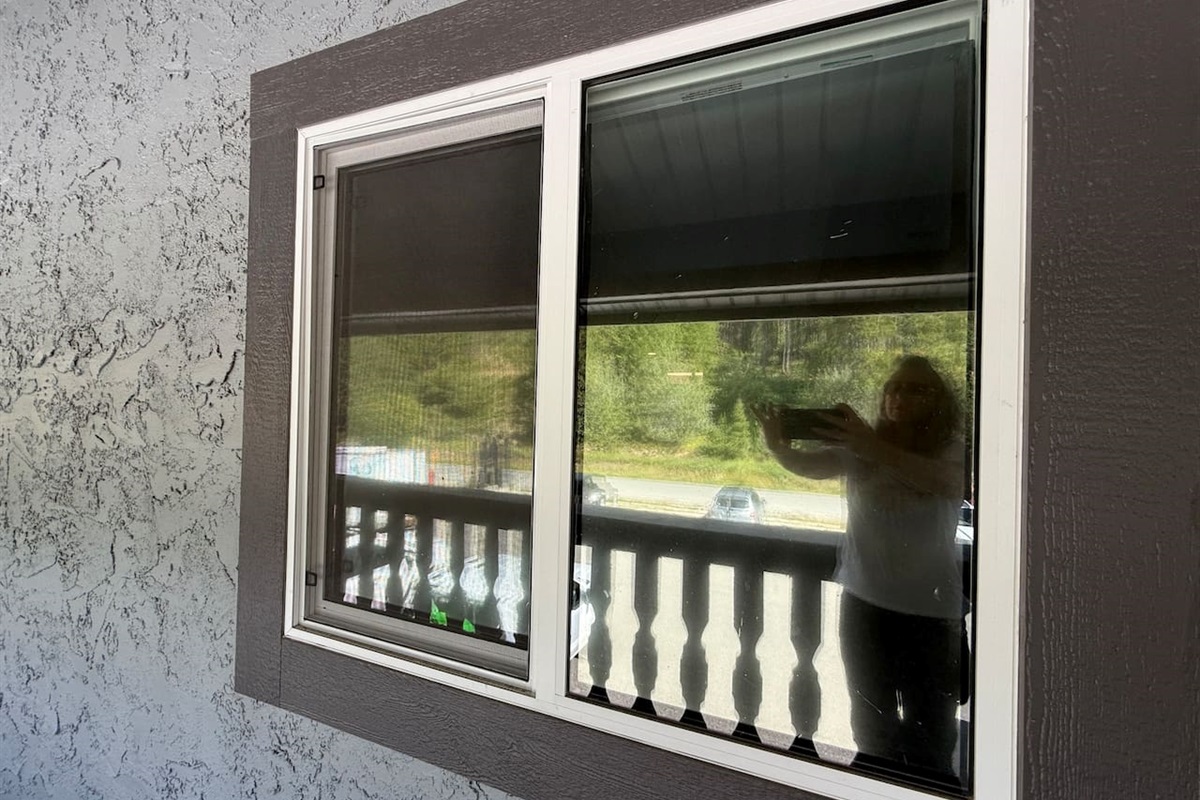 Privacy film added to the main floor bedroom so you can enjoy the view from the main floor bedroom without sacrificing privacy. The room also has a blind to ensure absolute privacy when desired. 