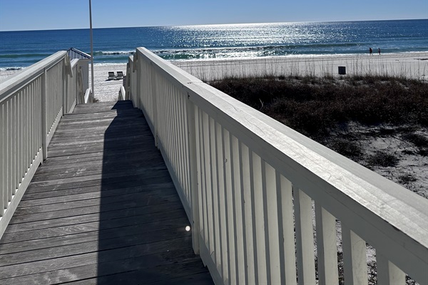 Just a hint of beach from beach walkover #4 on bright, beautiful day.  Come experience for yourself.