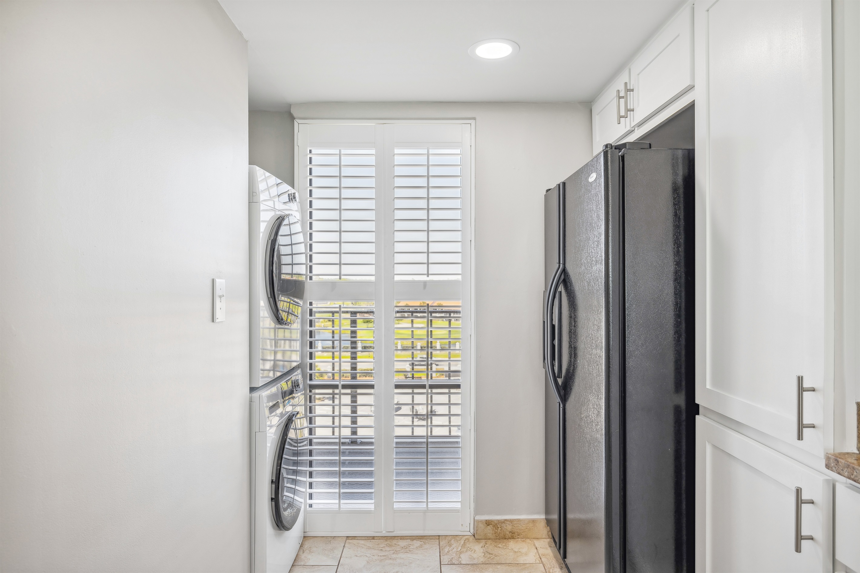 Washer/Dryer, elegant plantation shutters