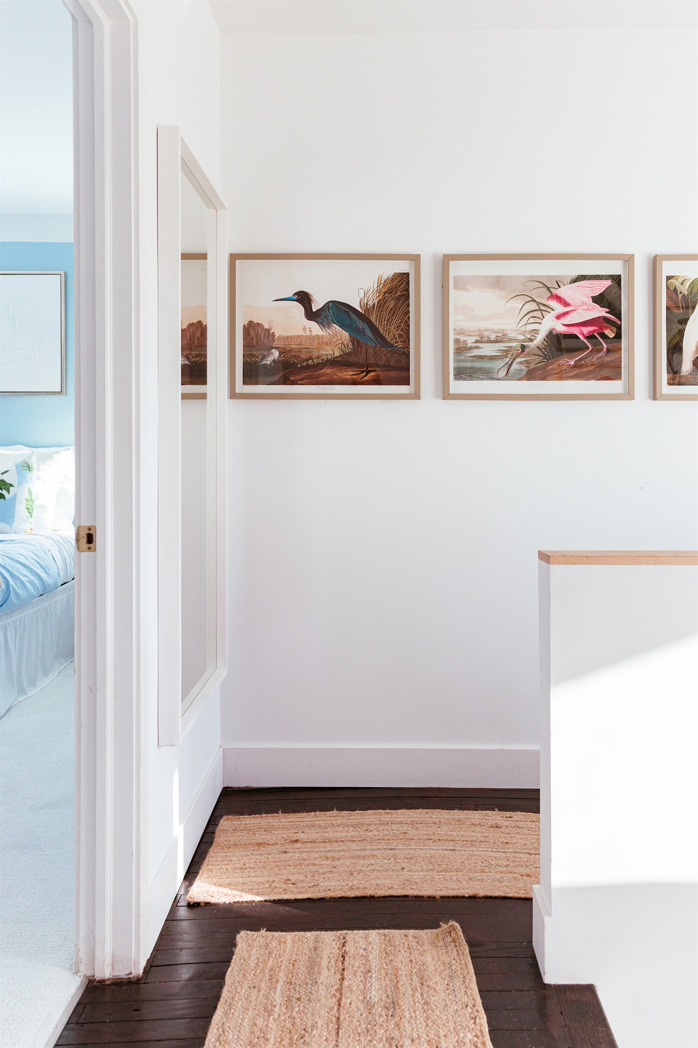 As you head upstairs, drawings of fowl local to the area bring the outdoors inside.